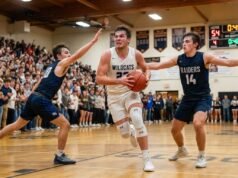 How Long Are High School Basketball Games? A Complete Breakdown High school basketball game in progress with scoreboard clock visible during a fourth-quarter play in a packed gymnasium.